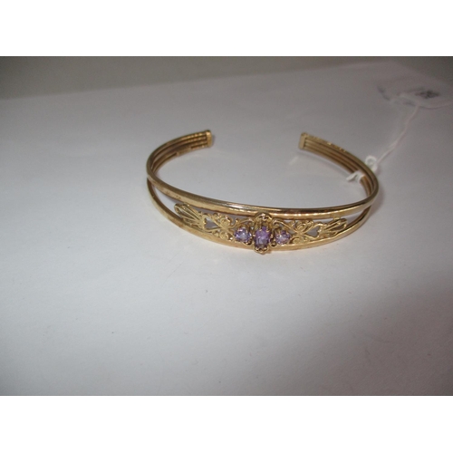 325 - 9ct Gold and Amethyst Bangle, 6.5g