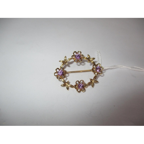 358 - 9ct Gold Oval Wreath Brooch Set with Four Amethysts