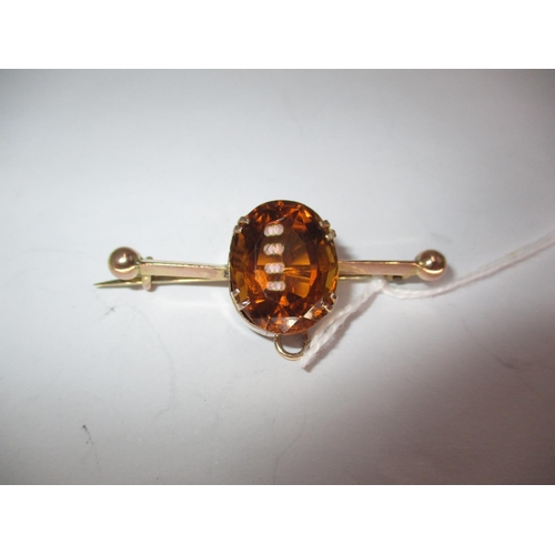 408 - 9ct Gold Bar Brooch Set with a Large Oval Faceted Madeira Citrine