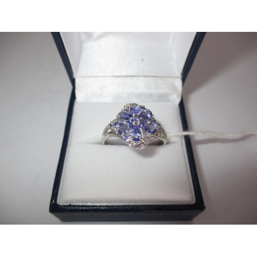 428 - Tanzanite and Diamond Ring