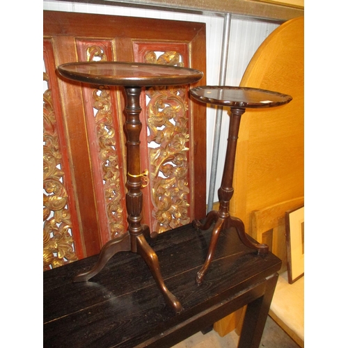 587 - Two Mahogany Tripod Wine Tables