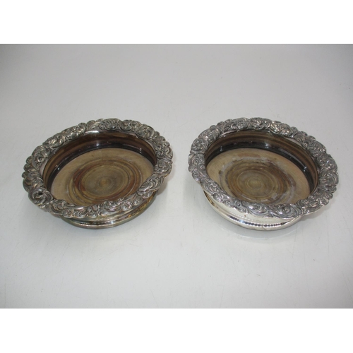 325 - Pair of Silver Plate and Wood Decanter Coasters