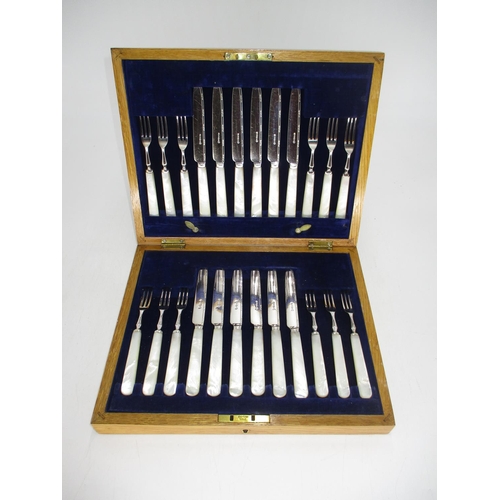 435 - Oak Cased Set of 12 Pairs of Silver Plate and Mother of Pearl Fruit Knives and Forks