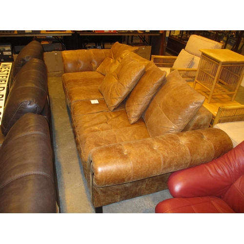 560 - Large Tan Buttoned Leather Settee