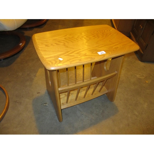 573 - Ercol Light Wood News Rack Table