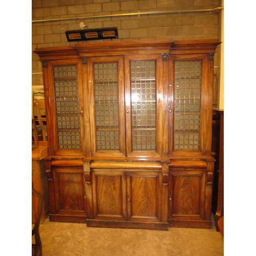 19th Century Mahogany Breakfront Library Bookcase having Glass and Brass Grille Doors to the Upper Section, 216cm