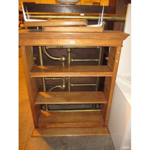 639 - Oak Bookshelves and a Brass Headboard