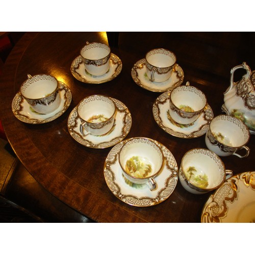 138 - Victorian Rockingham Style Porcelain Tea and Coffee Service Gilded and Painted with Scenes