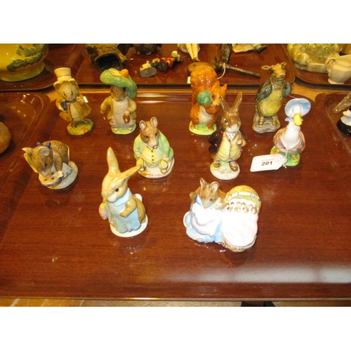 201 - Nine Beswick Beatrix Potter Figures and Another of The Mock Turtle