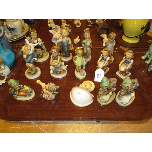 205 - Fourteen Hummel Figures