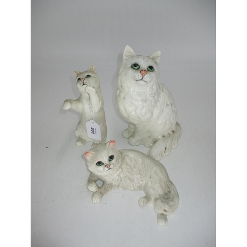 300 - Three Beswick Cats, Nos. 1883, 1876, 1867