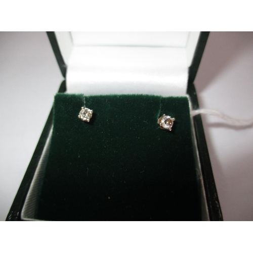 311C - Pair of 14ct White Gold Diamond Stud Earrings