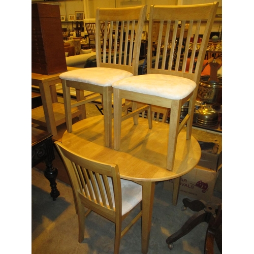 562 - Modern Light Wood Extending Dining Table with 4 Chairs