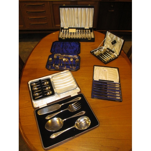 128 - Six Cases of Silver Plated Cutlery and Servers