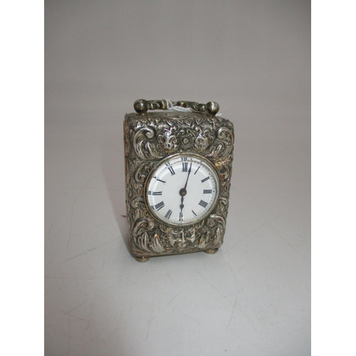 167 - Victorian Embossed Silver Case Bedside Clock having a French Movement, London 1891