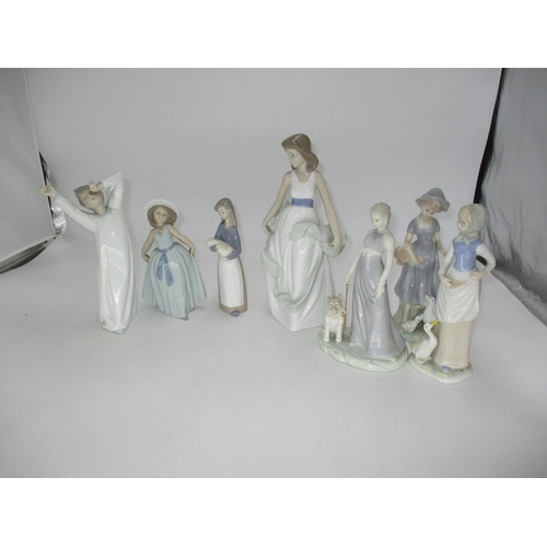 187 - Nao and 3 Lladro Figures, along with 3 Others