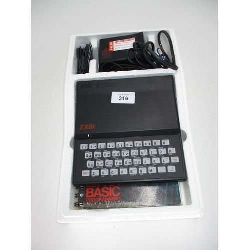 316 - Sinclair ZX81 with Charger and Instruction Book