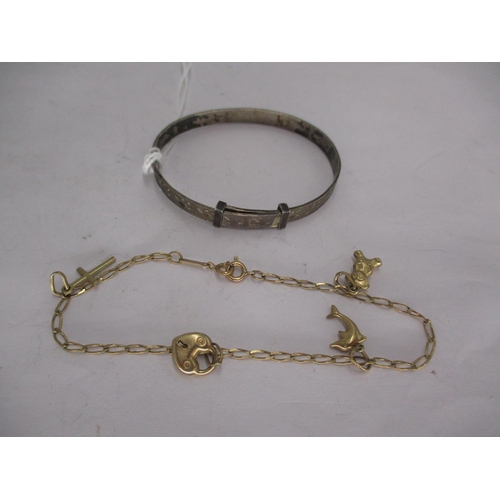 391 - 9KT Gold Charm Bracelet, 2g, and an Expanding Bangle