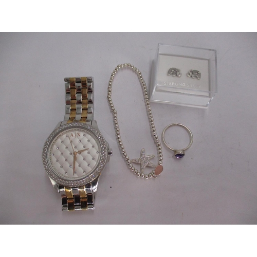 396 - Ladies Armani Exchange Watch, Silver Ring, Earrings and a Bracelet