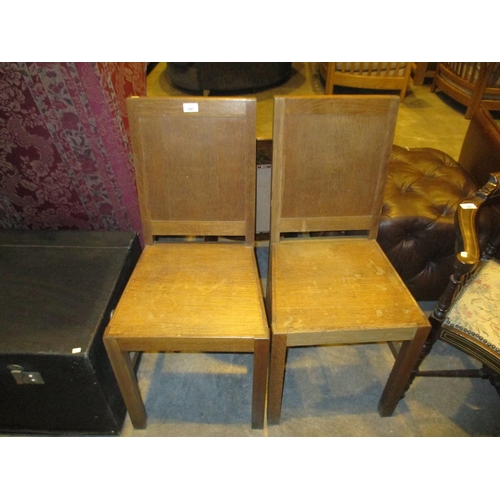 597 - Pair of Oak Eccelsiastical Chairs