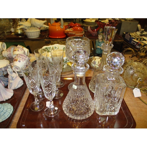 105 - Three Crystal Decanters, Large Goblet and 6 Champagne Flutes