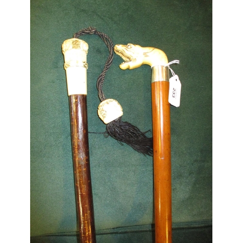 233 - Two Carved Handle Walking Sticks