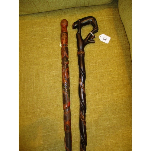 246 - Two Carved Wood Walking Sticks