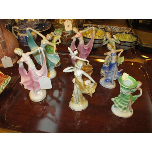 77 - Nine Art Deco Porcelain Figures