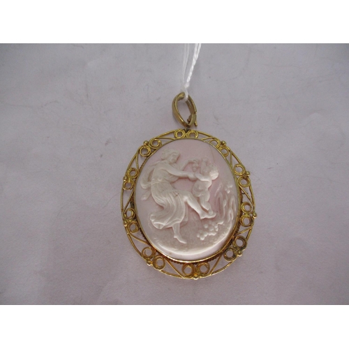 367 - Carved Cameo Pendant Brooch in a Yellow Metal Mount