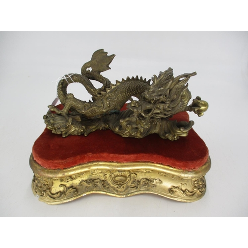 432 - Chinese Bronze Dragon, 22cm long, on a Gilded Stand