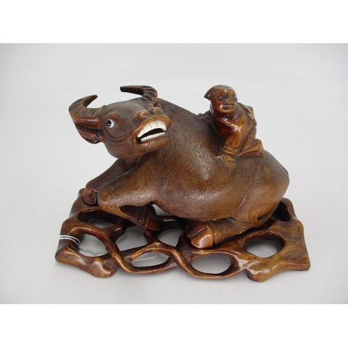 436 - Chinese Carved Wood Buffalo on a Stand, 24cm long