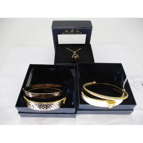 519 - Four Halcyon Days Gold Plated Bangles, and a Pendant, in Fitted Cases