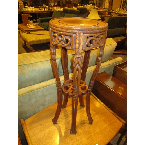 648 - Ornately Carved Plant Table