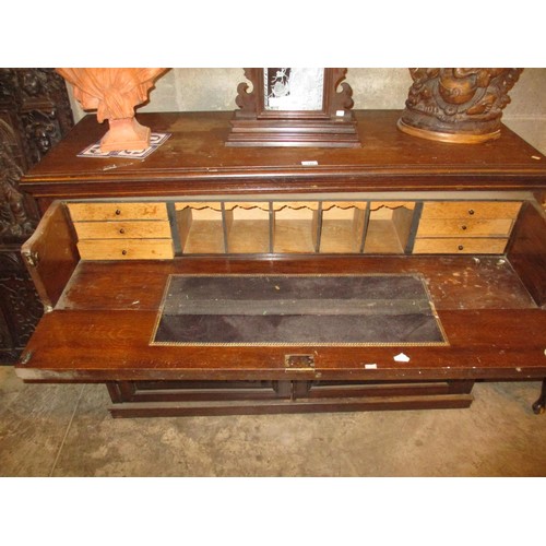 744 - Victorian Carved Oak Sideboard having a Secretaire Top Drawer, 135cm