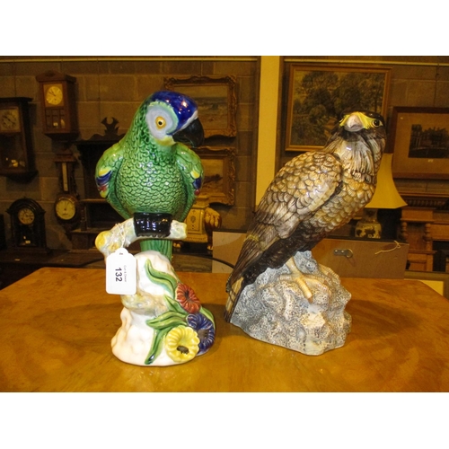 132 - Two Pottery Figures of a Bird of Prey and a Parrot