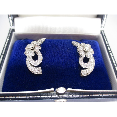 368 - Pair of Diamond Flower Design Earrings Set in White Metal