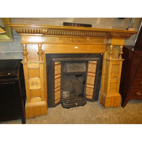 665 - Victorian Oak Mantelpiece with a Cast Metal and Tiled Insert and Marble Base