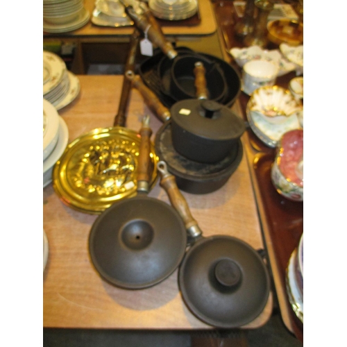 123 - Eight Metal Cooking Pots and a Reproduction Bed Warmer