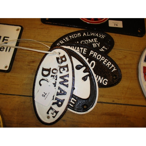 75 - Four Oval Cast Iron Signs