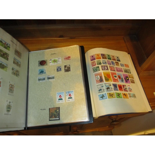 377 - Eight Albums of World Stamps