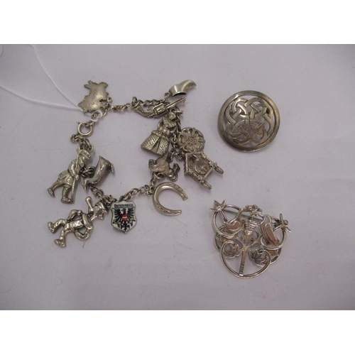 570 - Edinburgh Silver Bird Brooch, Silver Brooch and a Charm Bracelet