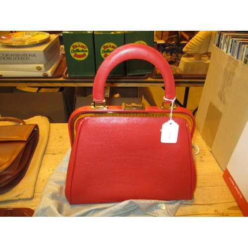 196 - Two Handbags Bearing Christian Dior Logos