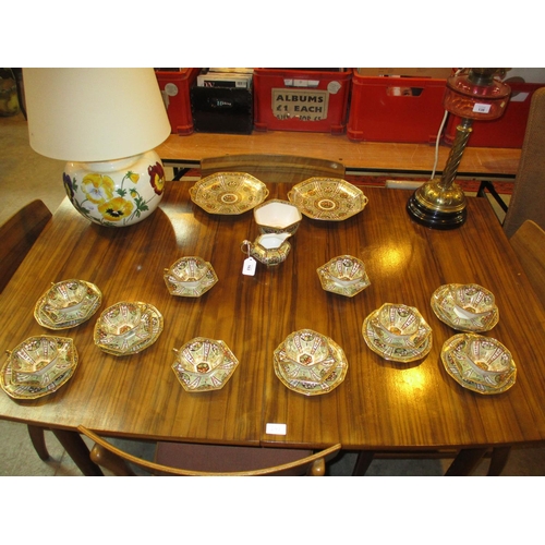 163 - Noritake Porcelain Gilded and Coloured 31 Piece Tea Set