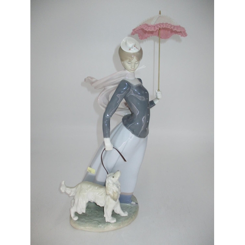 328 - Lladro Group of a Lady with Umbrella and Dog, 39cm