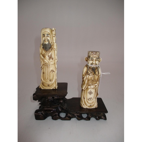 361 - Two Japanese Carved Bone Figures of a Mandarin and a Messenger, 13cm, with a Carved Wood Stand