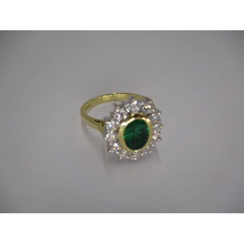 18ct Gold Emerald and Diamond Large Oval Cluster Ring