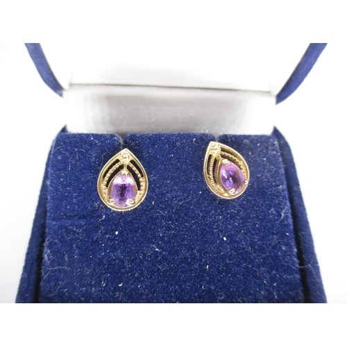 457 - Pair of 9ct Gold and Amethyst Stud Earrings