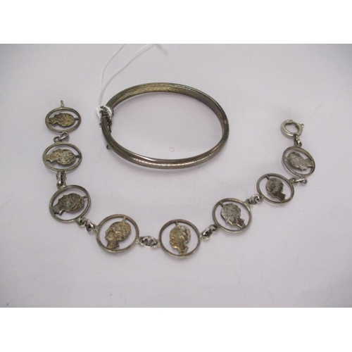 462 - Childs Silver Bangle by Charles Horner, Chester 1914, and a Cut Out Coin Bracelet