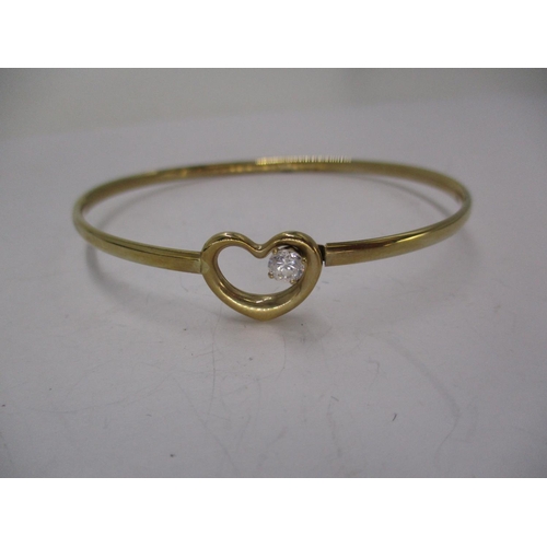 471 - 9ct Gold Heart Bangle Set with a Clear Stone, 3.2g