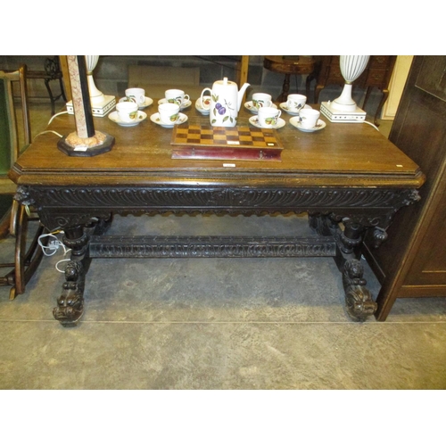 645 - Victorian Gothic Carved Oak Centre Table with Frieze Drawer and Serpent Supports, 140x80cm